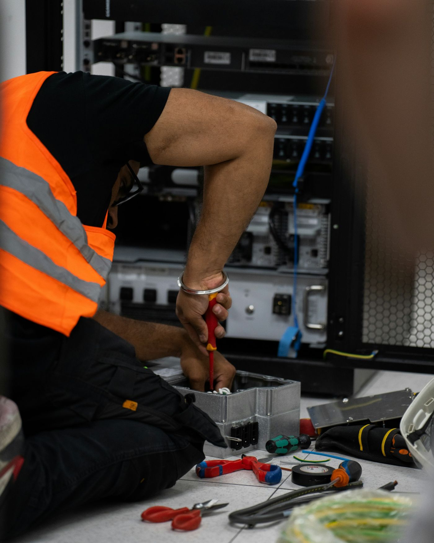 Electrician fitting a new consumer unit